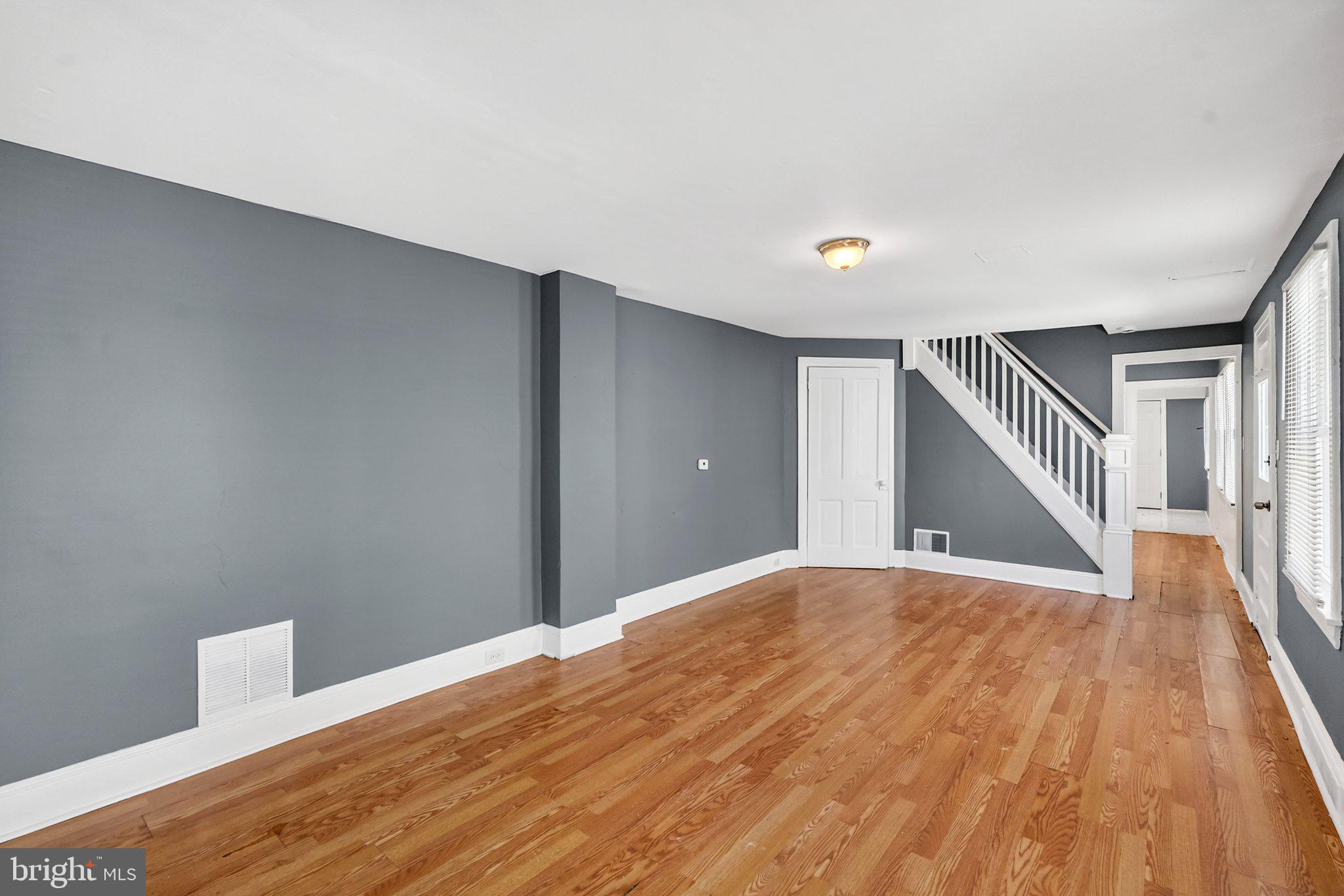 97 Chestnut Street Salem, NJ 08079 - Photo 5 of 38 a view of empty room with wooden floor