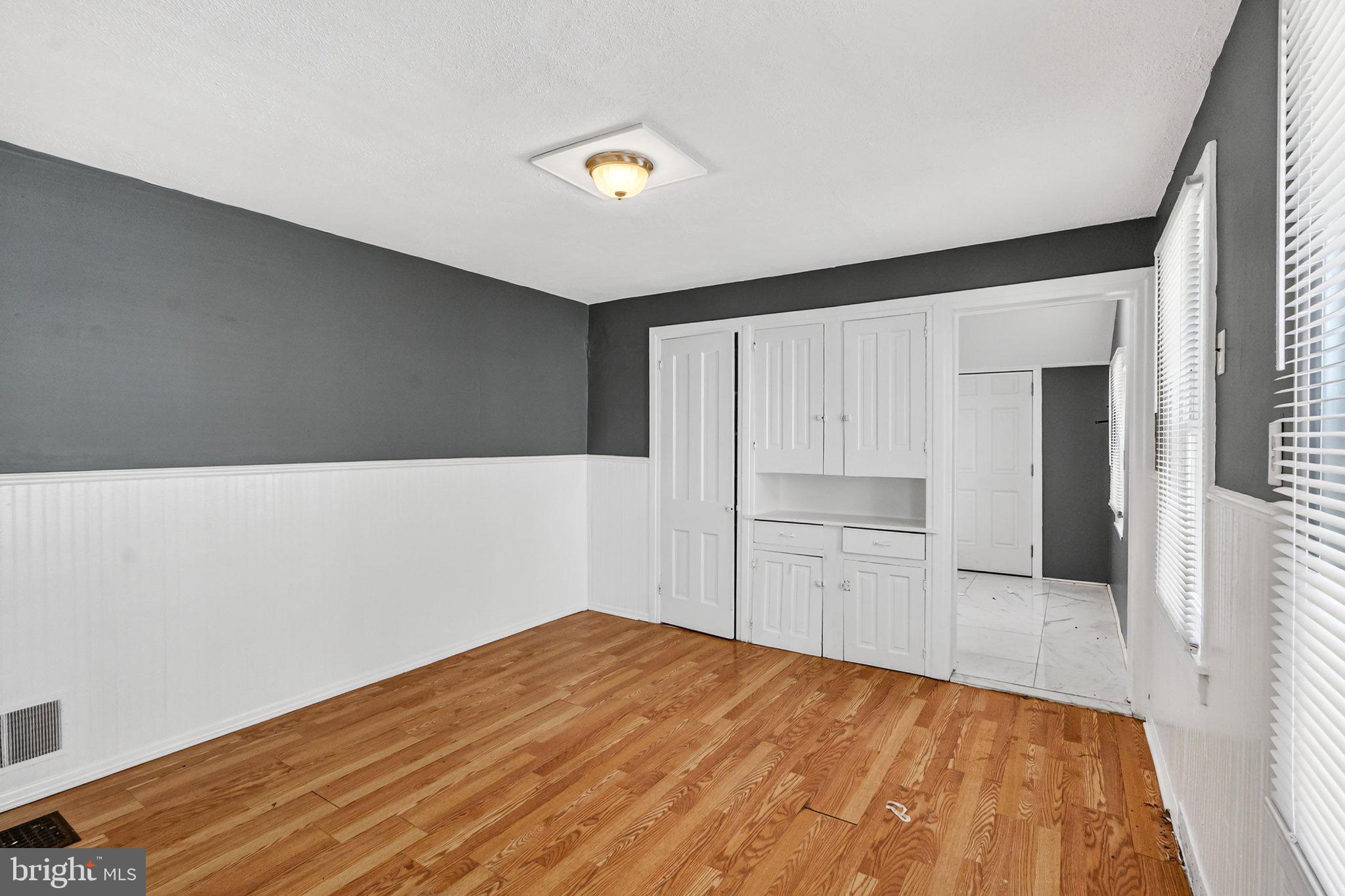 97 Chestnut Street Salem, NJ 08079 - Photo 8 of 38 a view of empty room with wooden floor
