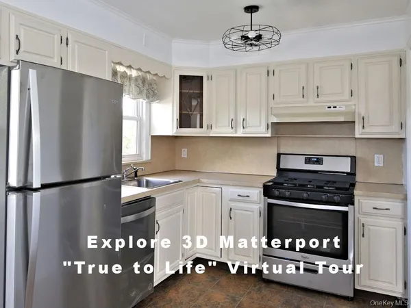 a kitchen with stainless steel appliances a stove a refrigerator and cabinets