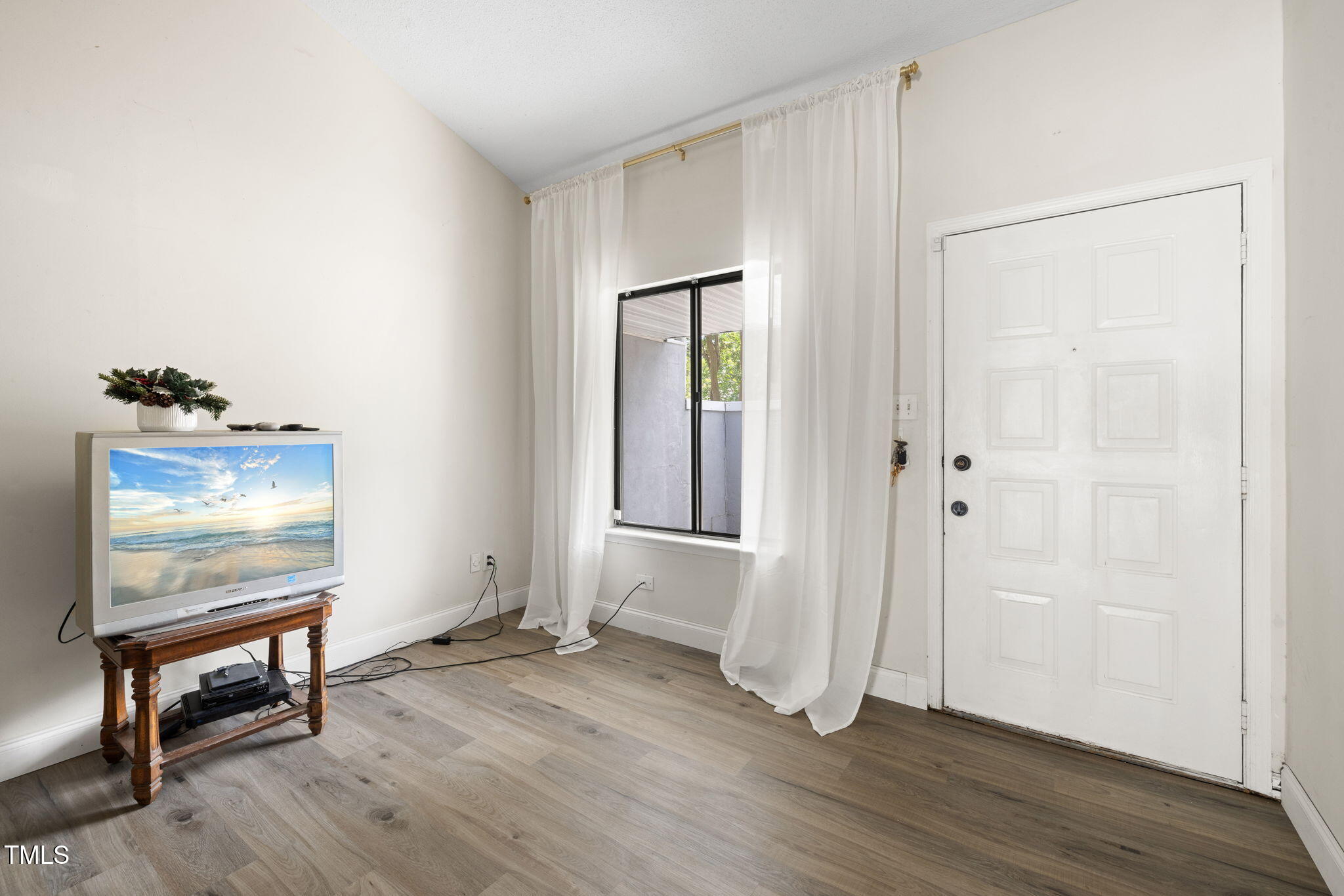 Front door enters into spacious 237 sq ft living room.