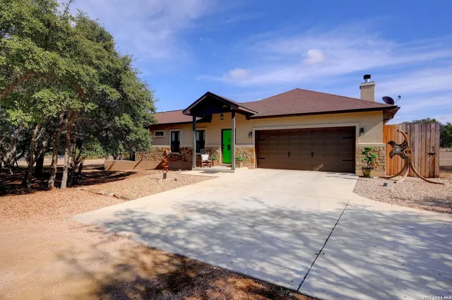 a view of a yard with trees