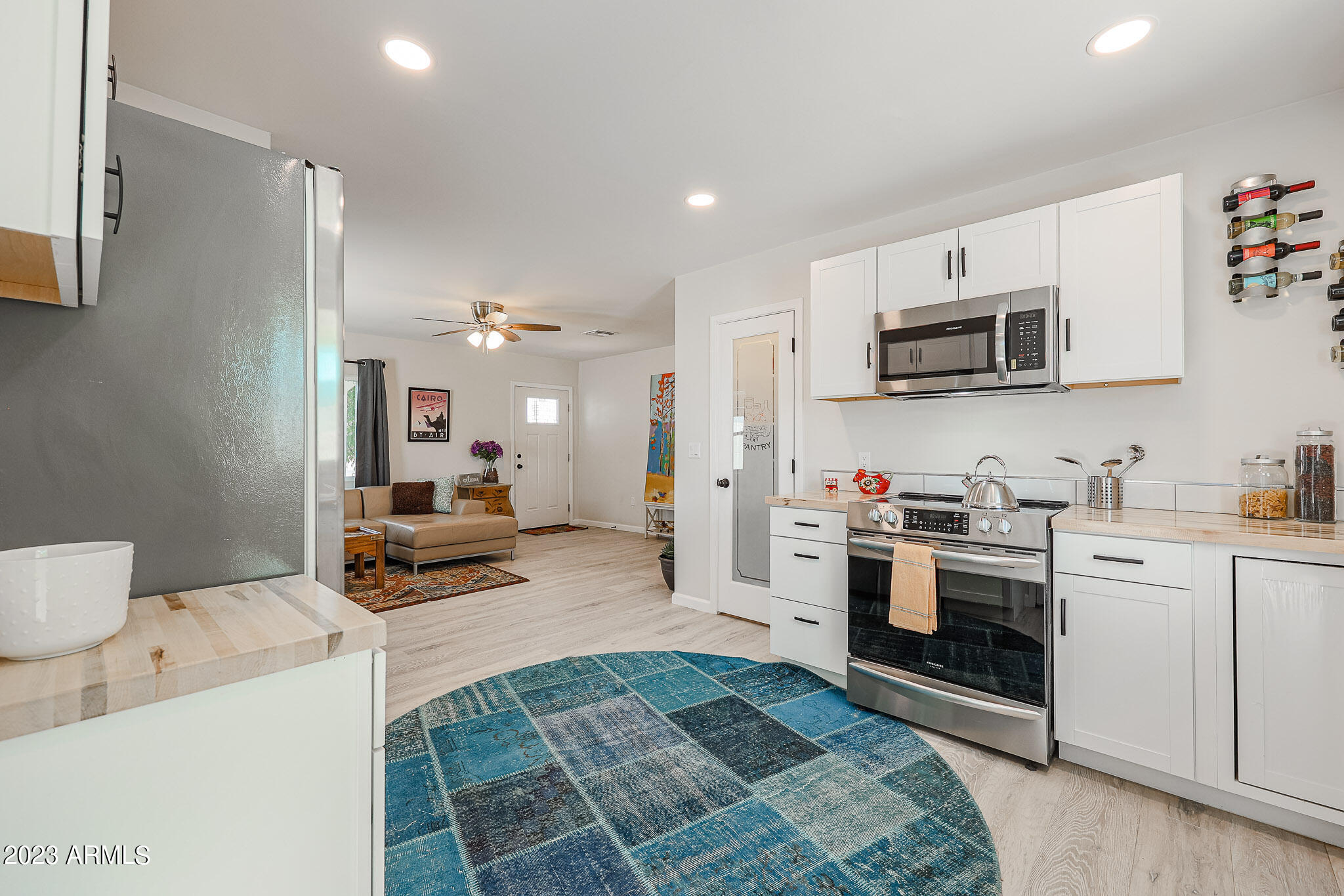 2547 West Adams Street Phoenix, AZ 85009 - Photo 6 of 42 Kitchen to living room