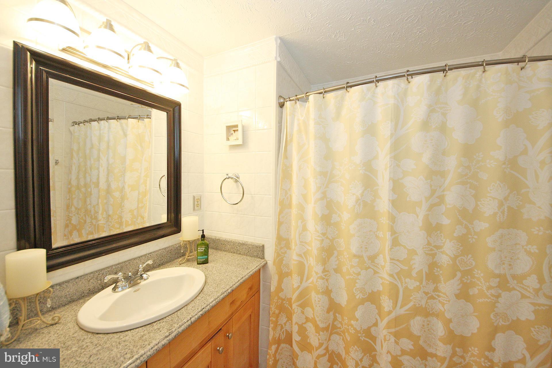 9326 Northgate Road Laurel, MD 20723 - Photo 22 of 30 Hall Bathroom
