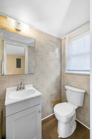 a view of a backyard with sitting area