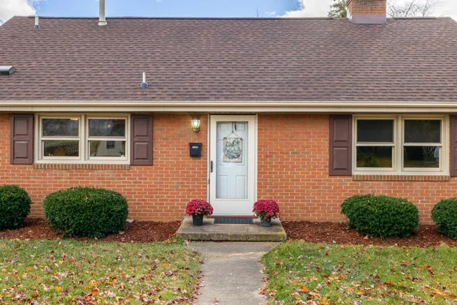 a bathroom with a shower and a mirror
