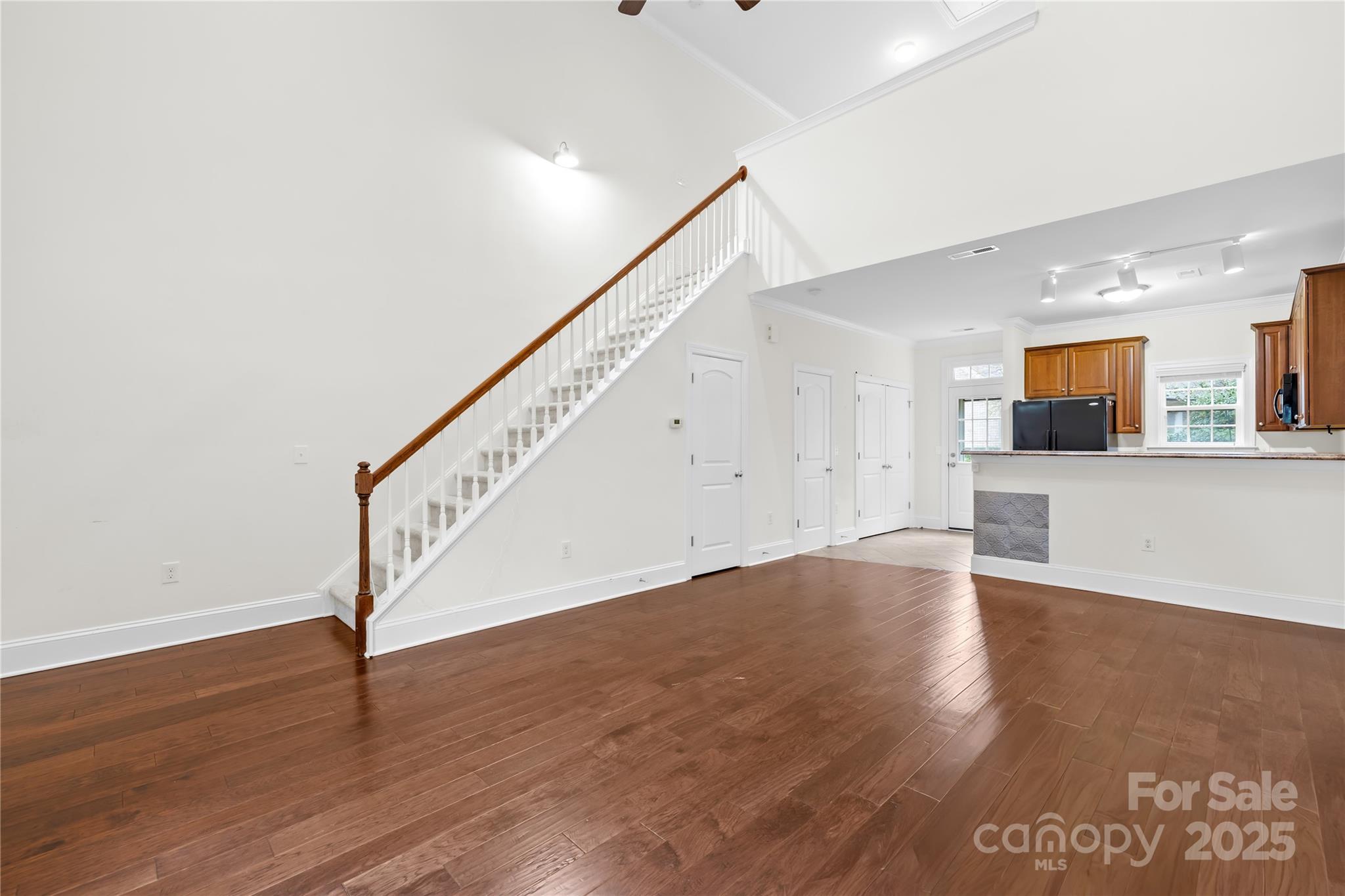 518 Armour Street Davidson, NC 28036 - Photo 14 of 26 a view of a kitchen with wooden floor and electronic appliances