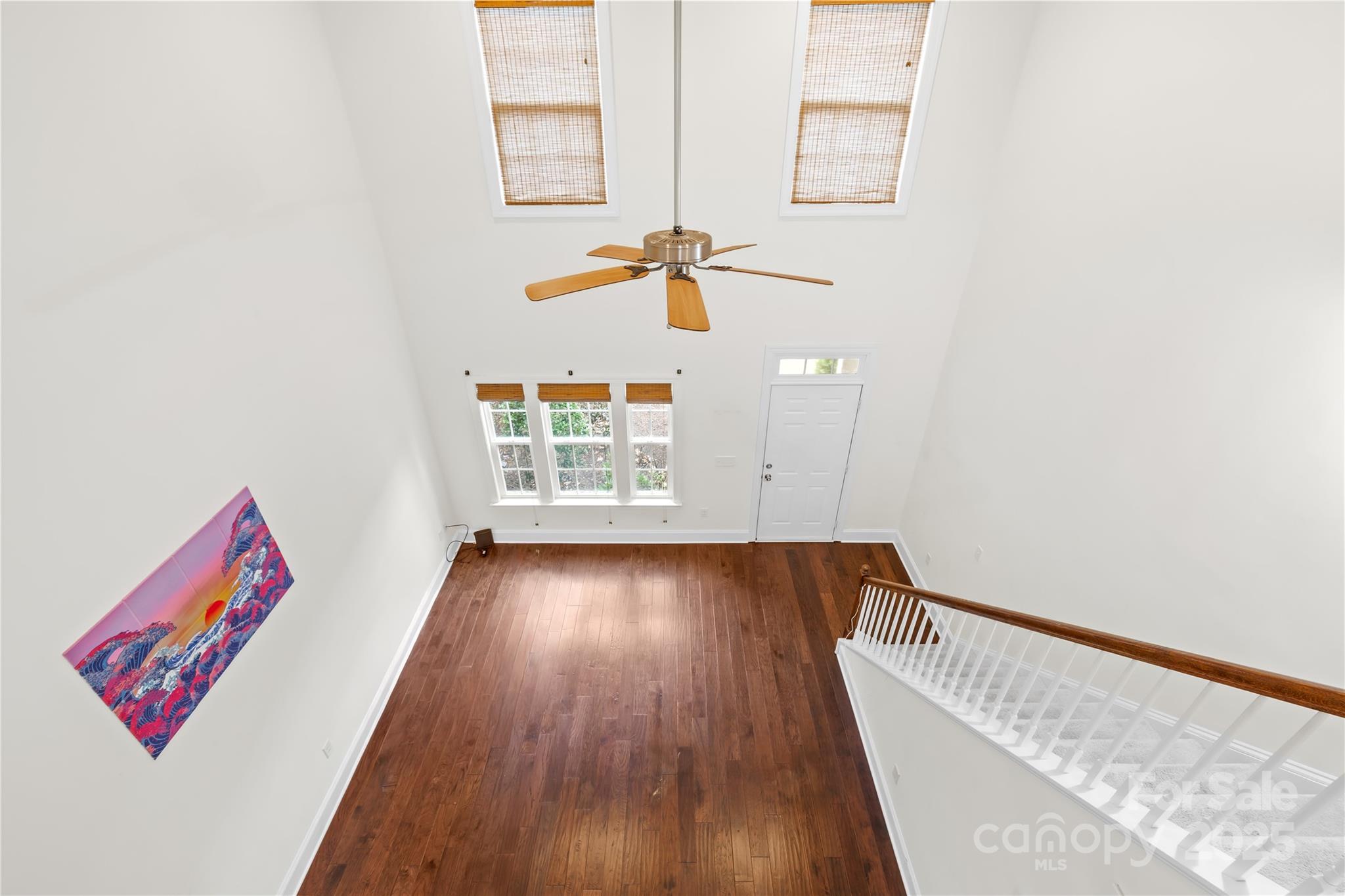 518 Armour Street Davidson, NC 28036 - Photo 19 of 26 a view of hallway with wooden floor and stairs