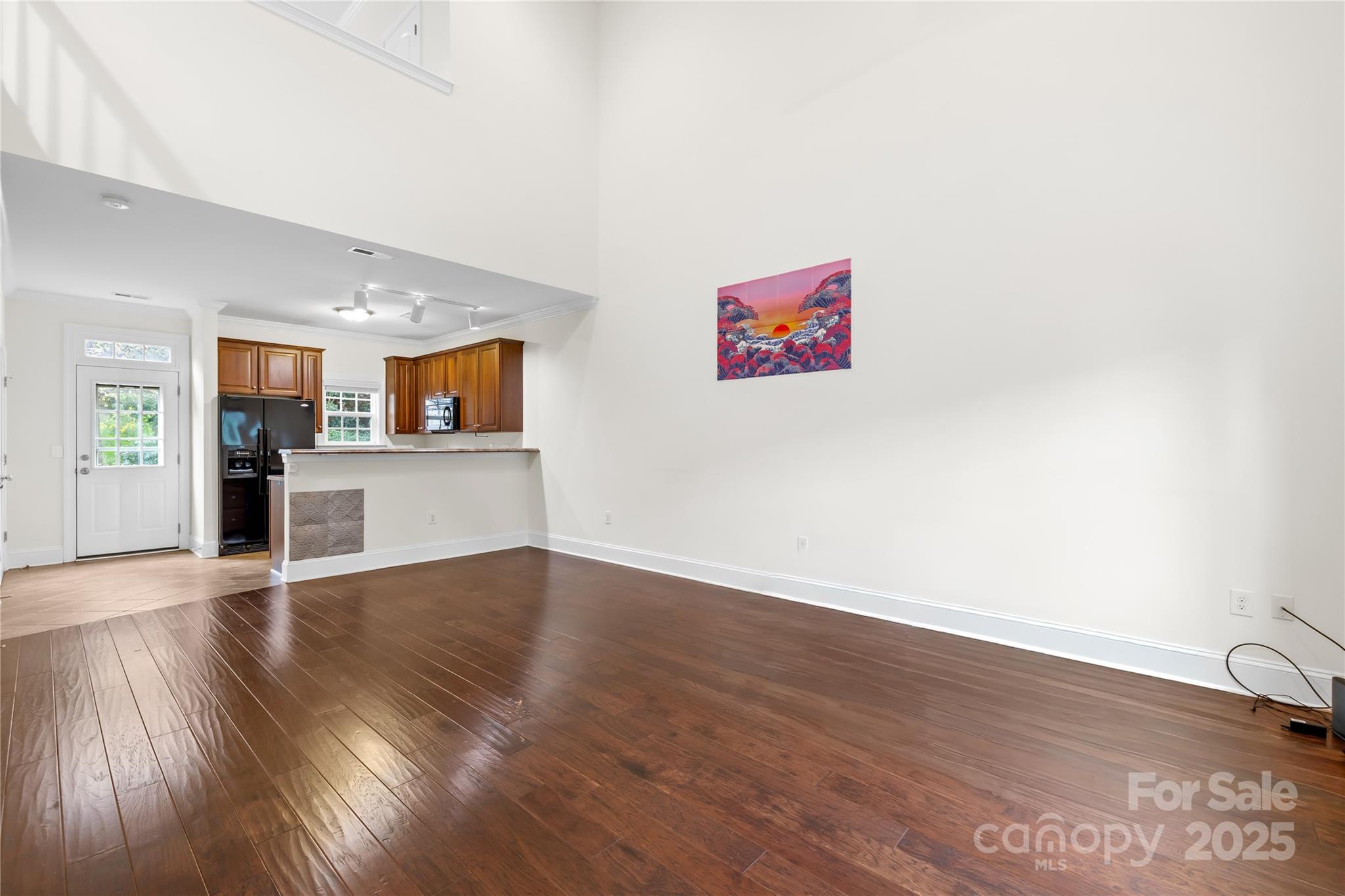 518 Armour Street Davidson, NC 28036 - Photo 20 of 26 a view of a kitchen with a sink and a microwave