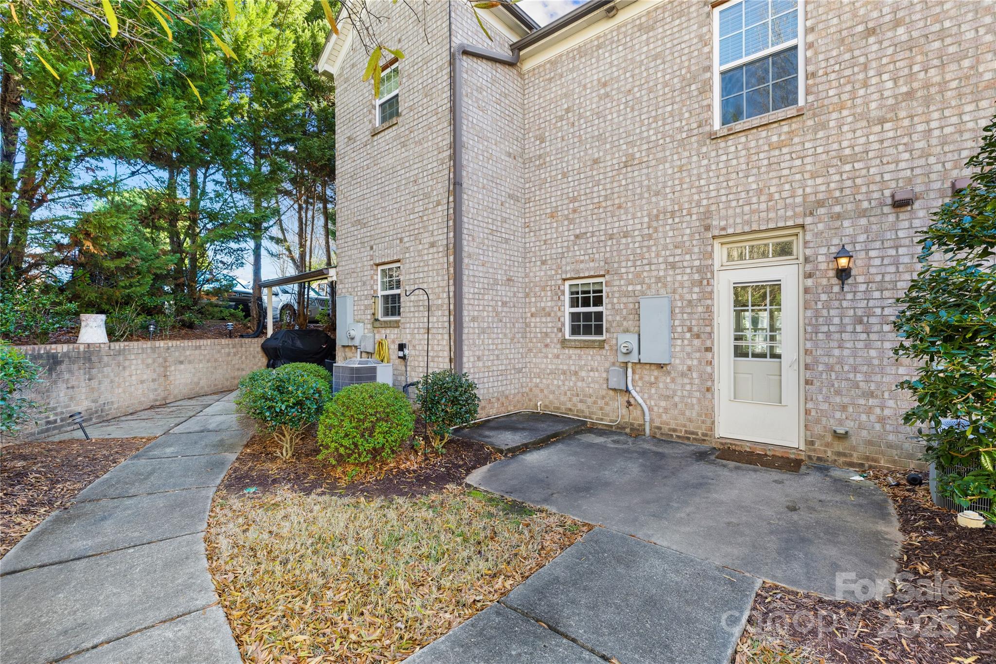 518 Armour Street Davidson, NC 28036 - Photo 21 of 26 a view of a pathway with a house