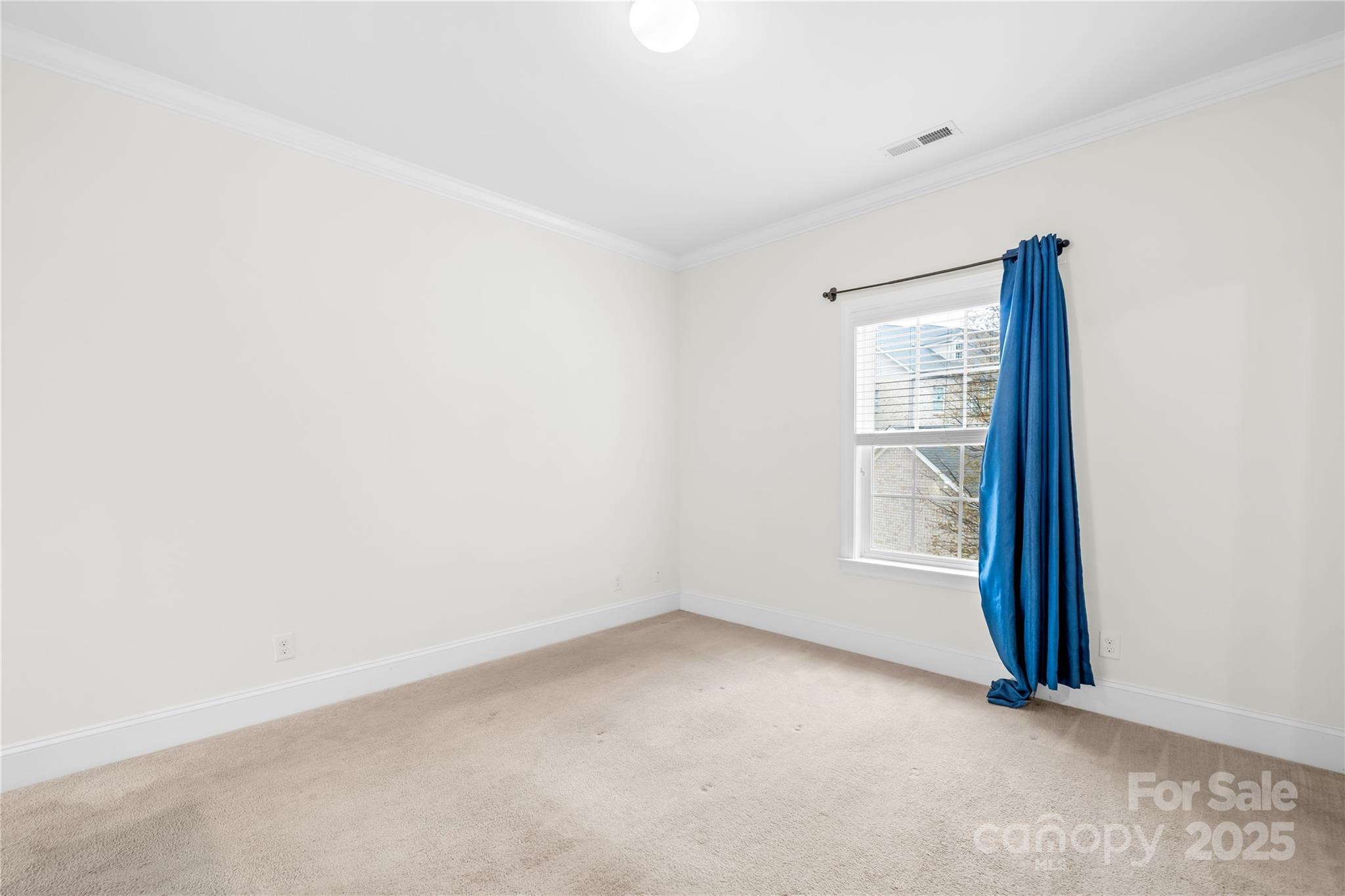518 Armour Street Davidson, NC 28036 - Photo 5 of 26 an empty room with windows