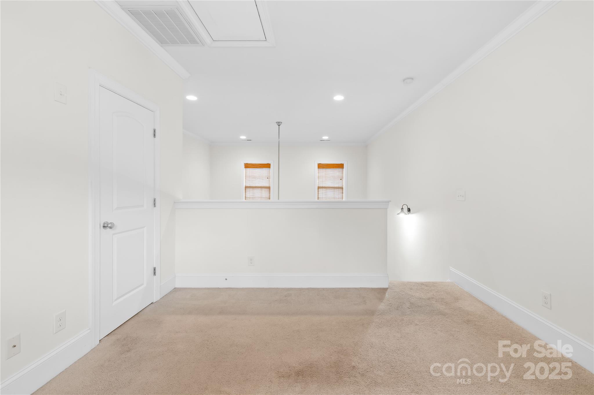 518 Armour Street Davidson, NC 28036 - Photo 6 of 26 an empty room with a empty space and windows