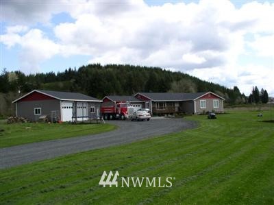 122 Kahout Road Curtis, WA 98538 - Photo 1 of 1 a front view of a house with garden
