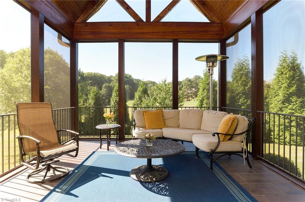 1350 Kilkenny Lane Rural Hall, NC 27045 - Photo 14 of 49 Screened porch off the kitchen - look at the view - all new woodwork