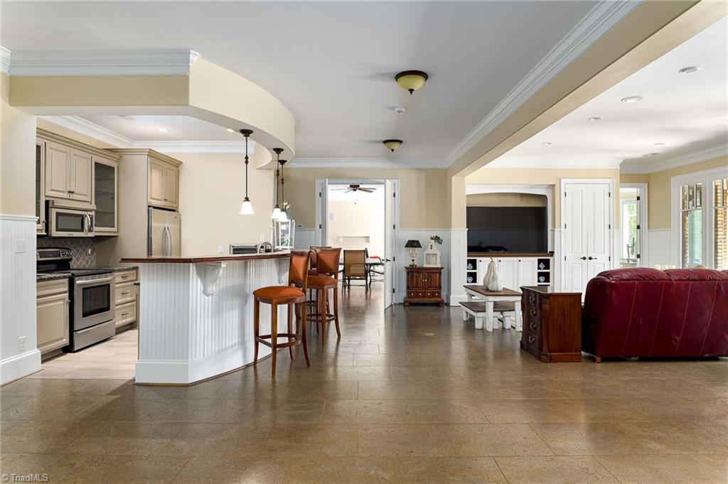 1350 Kilkenny Lane Rural Hall, NC 27045 - Photo 29 of 49 Lower level living room, kitchen with bar