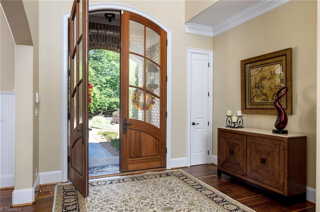 1350 Kilkenny Lane Rural Hall, NC 27045 - Photo 5 of 49 Beautiful double door entry with vaulted ceiling, brand new American Walnut real wood floors!