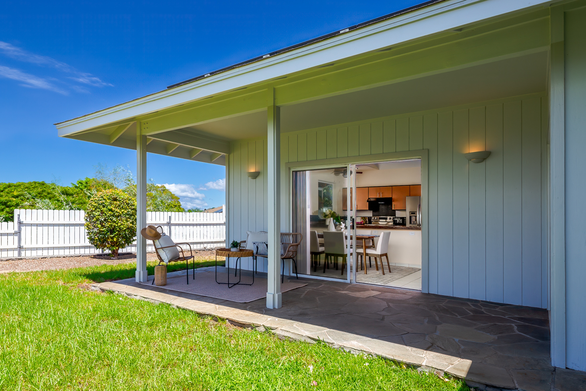 68-1704 Akaula Court Waikoloa, HI 96738 - Photo 11 of 30 a view of an house with backyard porch and furniture