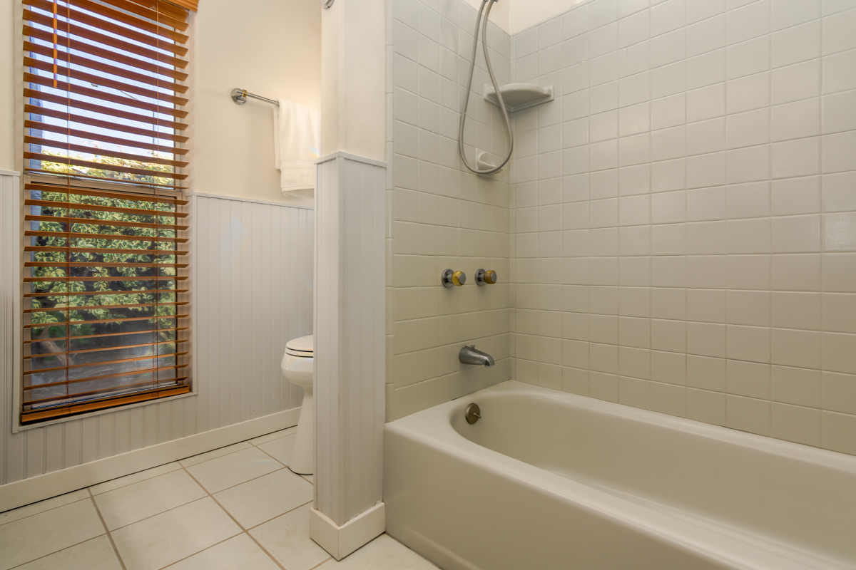 68-1704 Akaula Court Waikoloa, HI 96738 - Photo 15 of 30 a bathroom with a bathtub and shower