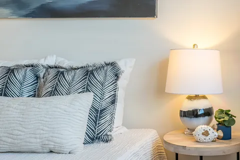 a bedroom with a bed and a couch