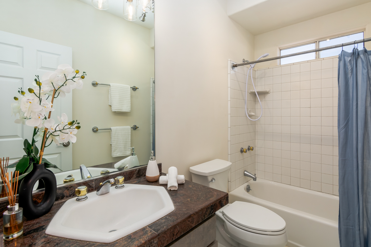 68-1704 Akaula Court Waikoloa, HI 96738 - Photo 21 of 30 a bathroom with a sink toilet and shower