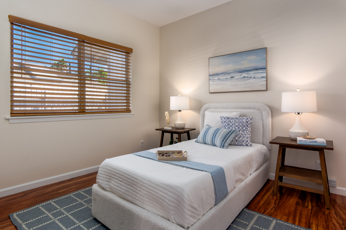 68-1704 Akaula Court Waikoloa, HI 96738 - Photo 22 of 30 a bedroom with a bed and a window
