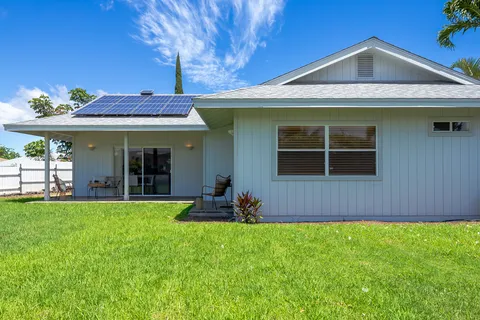 a view of a house with a garden