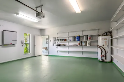 a view of a kitchen with furniture and a window