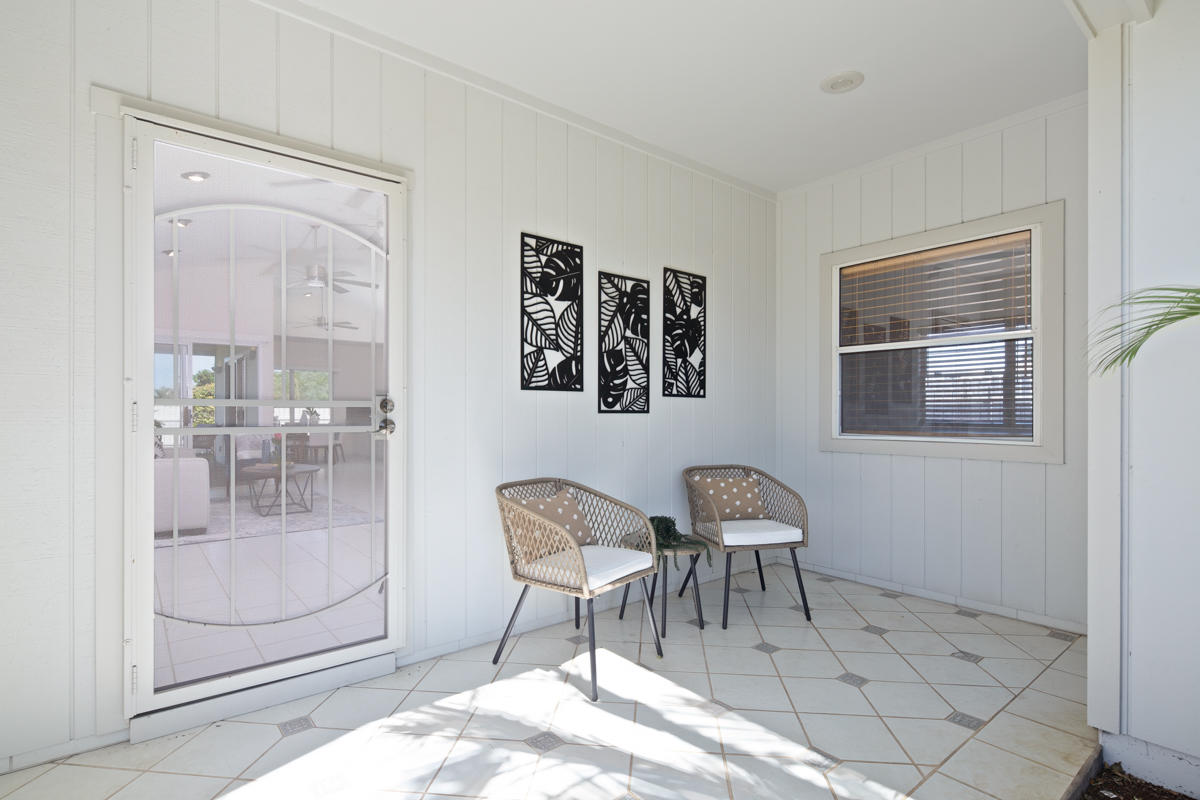 68-1704 Akaula Court Waikoloa, HI 96738 - Photo 4 of 30 a dining room with furniture and glass door