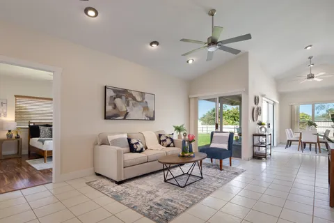 a living room with furniture and view of living room