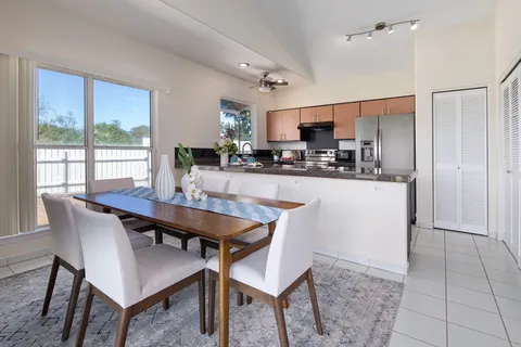 a view of a dining room with furniture