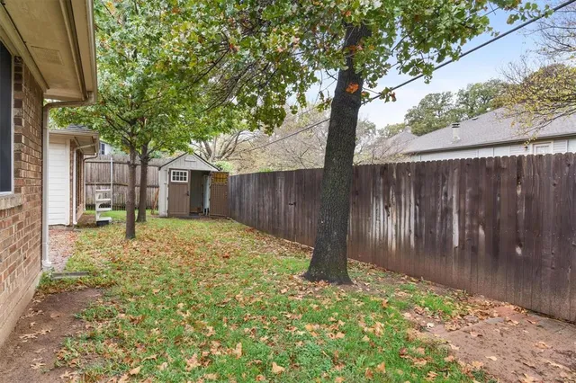 a house with trees in front of it