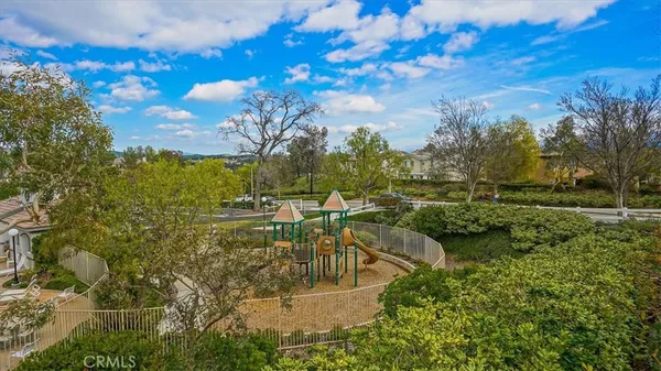 a view of a lake with a yard