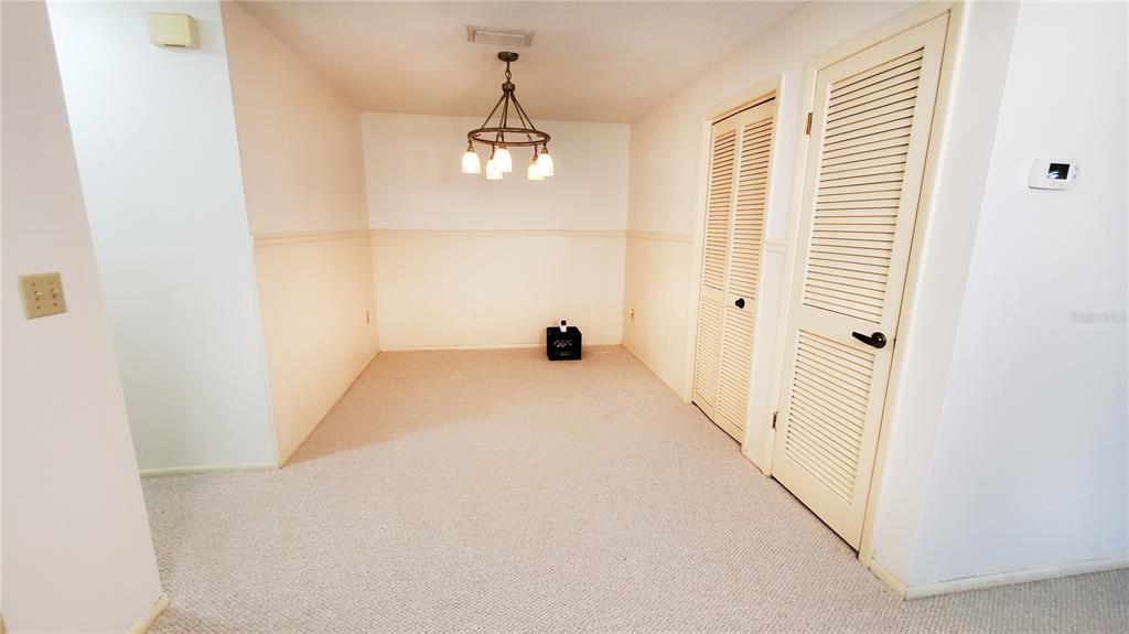 603 Baldwin Avenue, Unit B Safety Harbor, FL 34695 - Photo 6 of 32 a view of empty room with a window