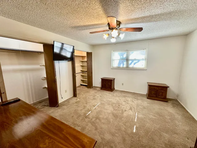 a view of livingroom with workspace