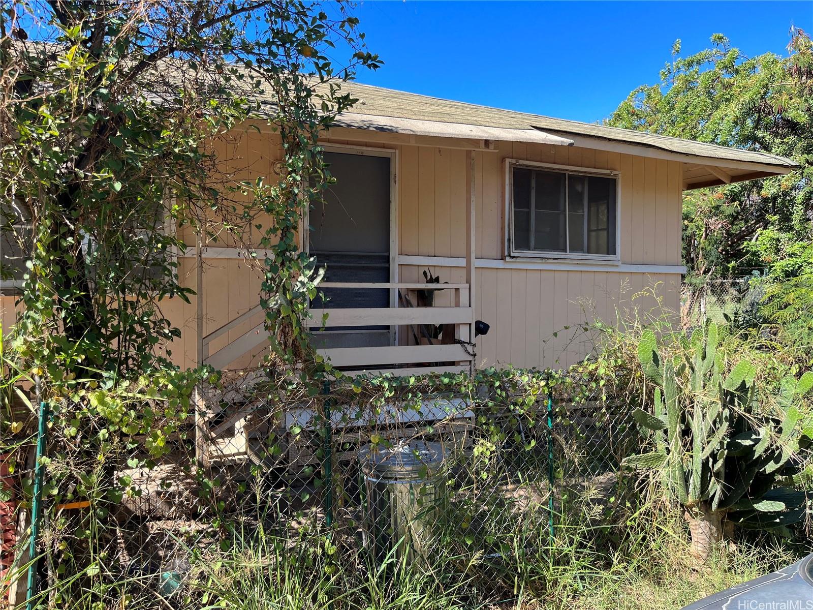 85-824 Lihue Street Waianae, HI 96792 - Photo 21 of 21 a view of a house with a yard