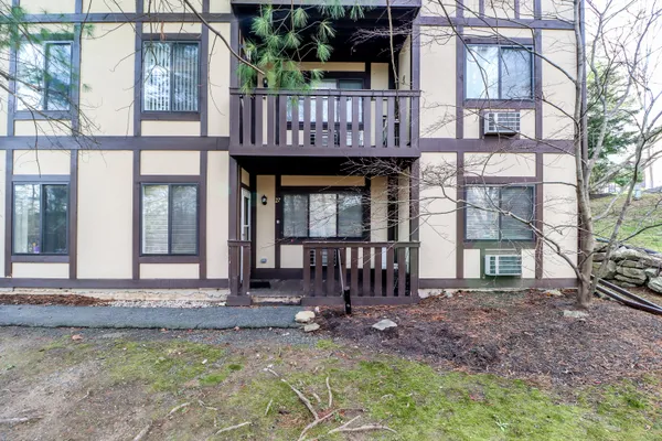 a view of house with front door