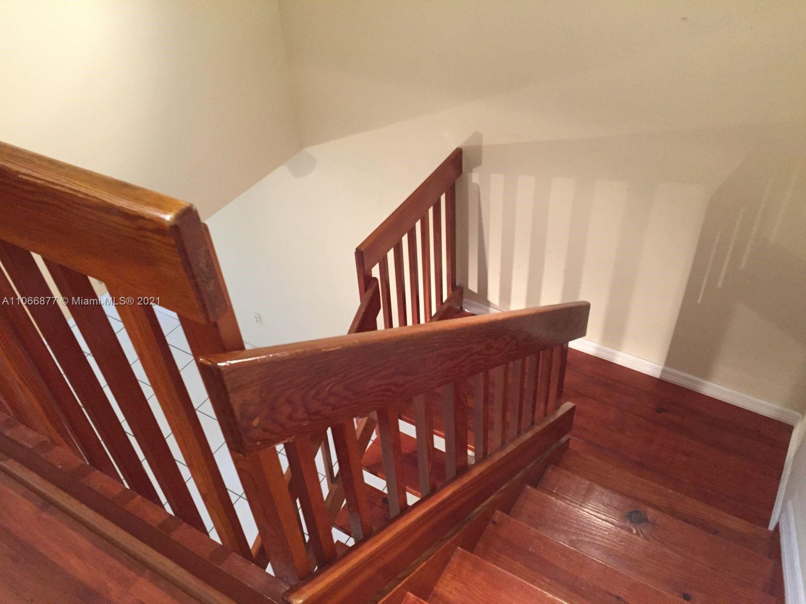 11820 Southwest 80th Street, Unit 312 Miami, FL 33183 - Photo 19 of 43 a view of stairs