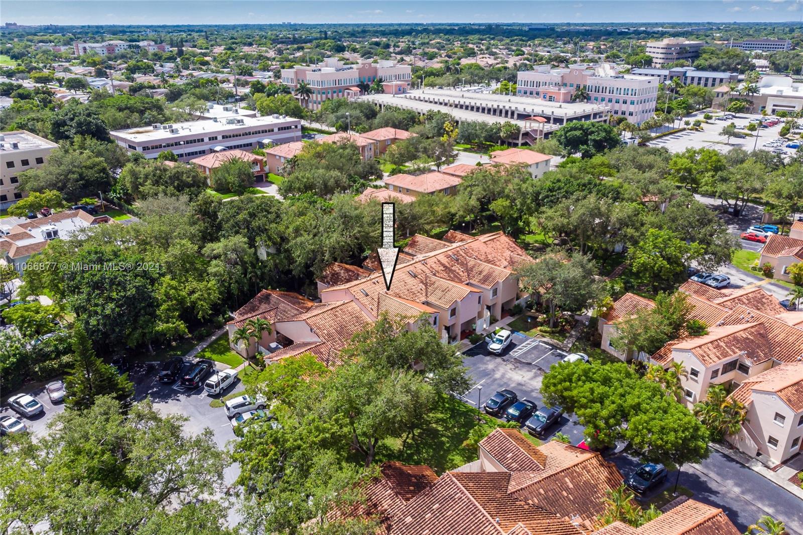 11820 Southwest 80th Street, Unit 312 Miami, FL 33183 - Photo 3 of 43 an aerial view of residential houses with outdoor space