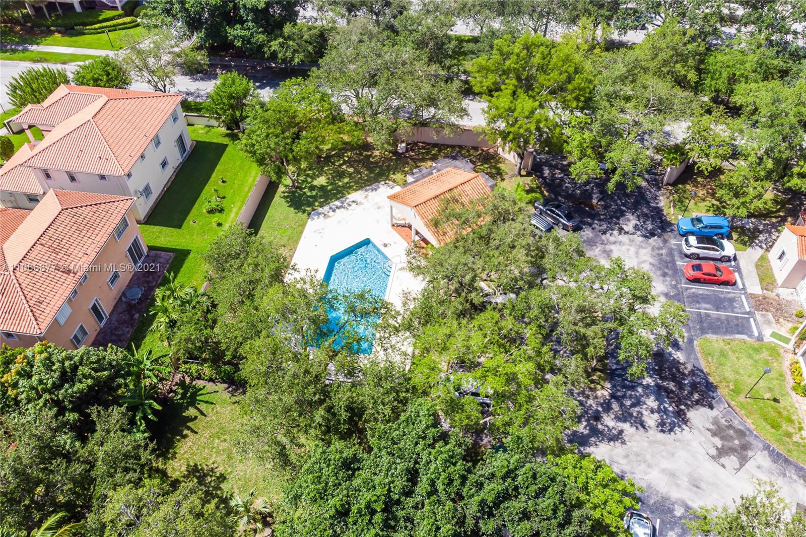 11820 Southwest 80th Street, Unit 312 Miami, FL 33183 - Photo 38 of 43 an aerial view of a house with a yard basket ball court and outdoor seating
