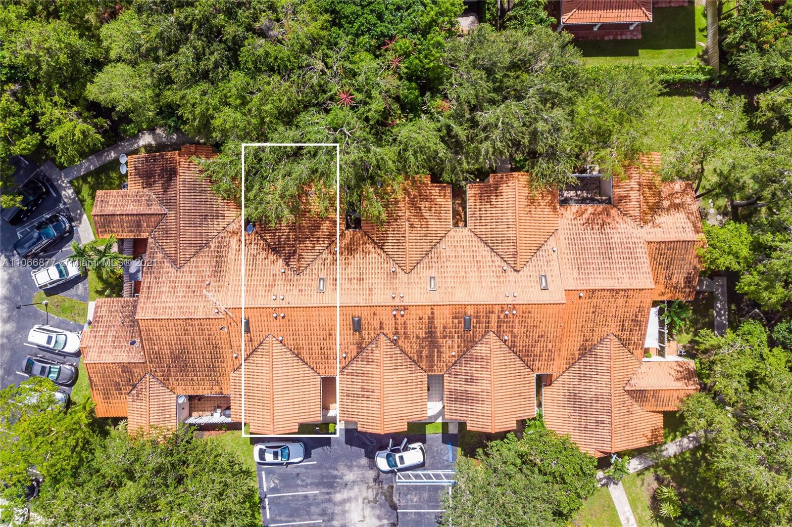 11820 Southwest 80th Street, Unit 312 Miami, FL 33183 - Photo 4 of 43 an aerial view of a house with a yard and lake view