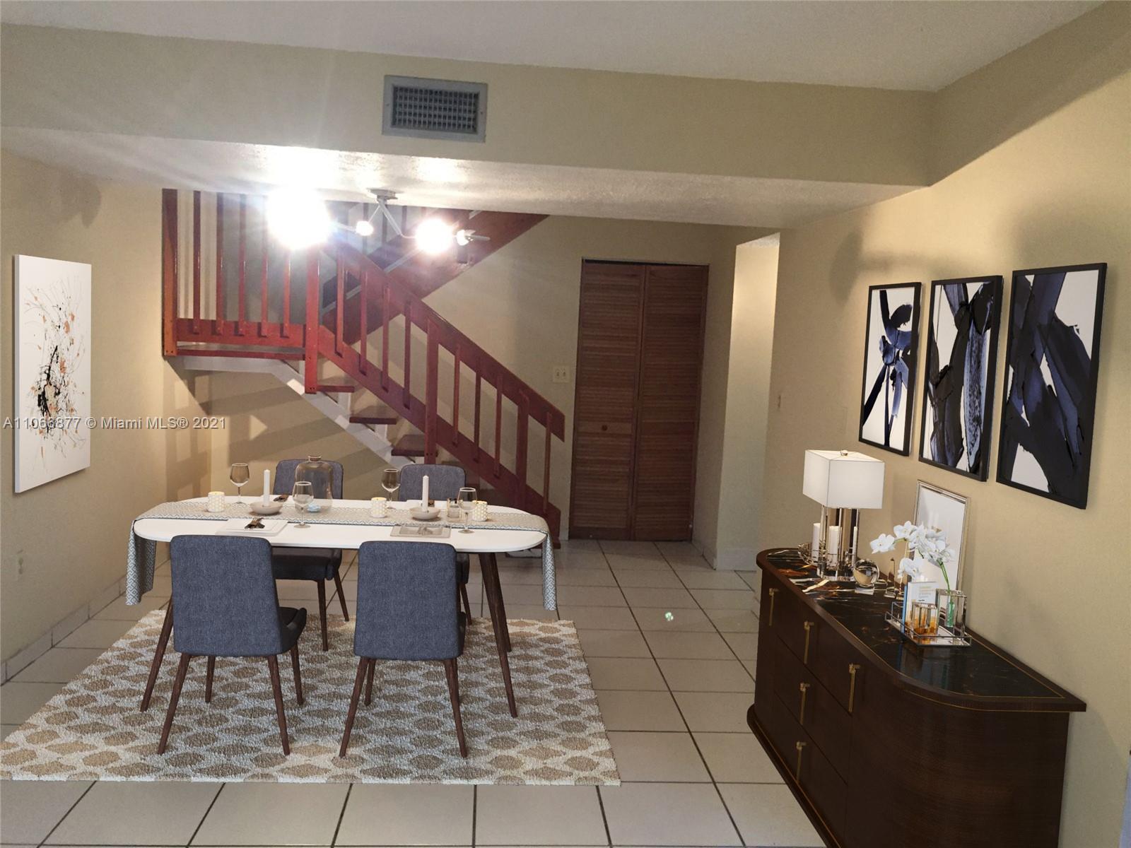 11820 Southwest 80th Street, Unit 312 Miami, FL 33183 - Photo 43 of 43 a view of a dining room with furniture