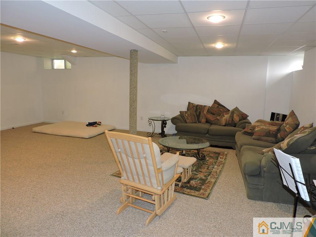 236 Hawthorne Road North Brunswick, NJ 08902 - Photo 18 of 25 a living room with furniture