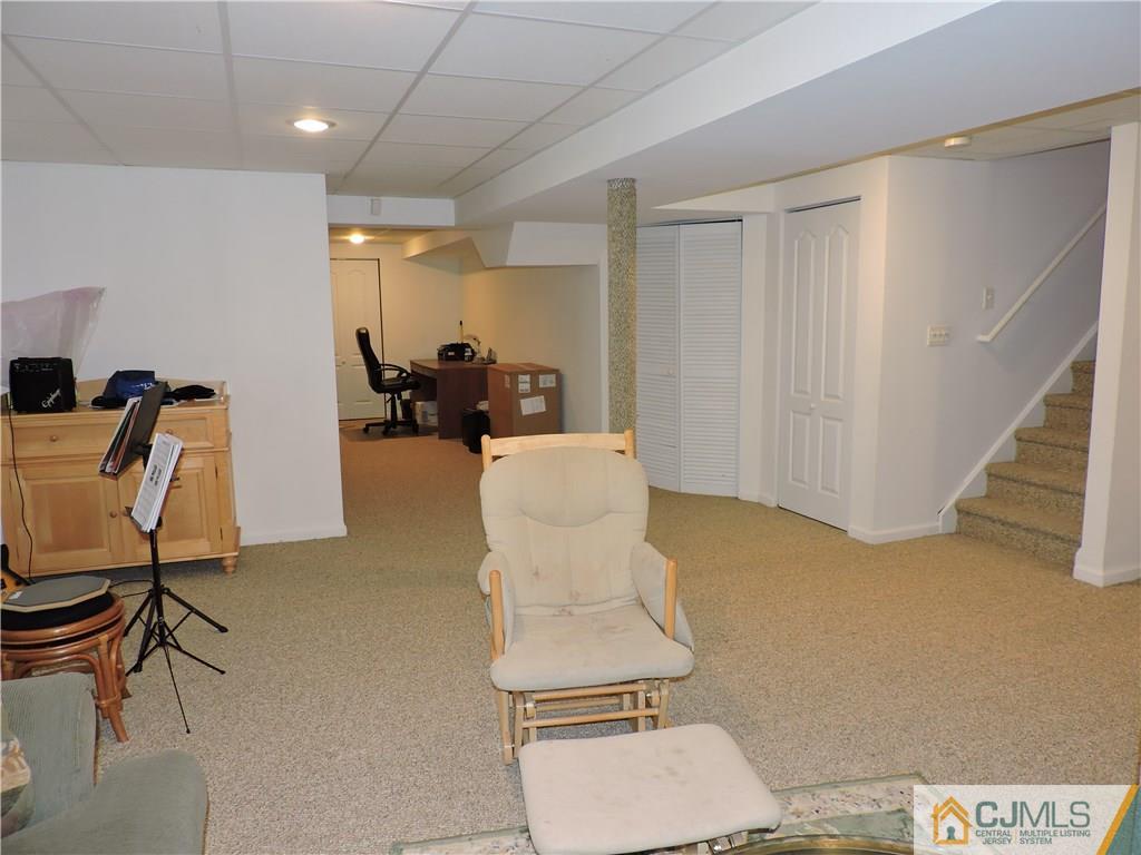 236 Hawthorne Road North Brunswick, NJ 08902 - Photo 19 of 25 a view of a room with gym equipment