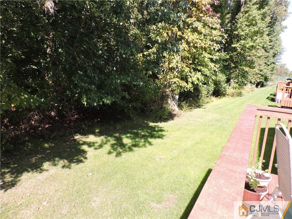 236 Hawthorne Road North Brunswick, NJ 08902 - Photo 22 of 25 a view of swimming pool with a yard