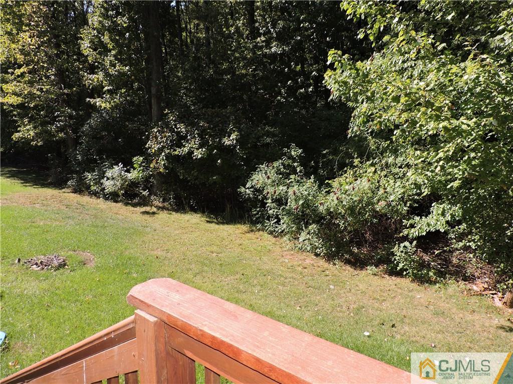 236 Hawthorne Road North Brunswick, NJ 08902 - Photo 23 of 25 a view of a yard with an outdoor space