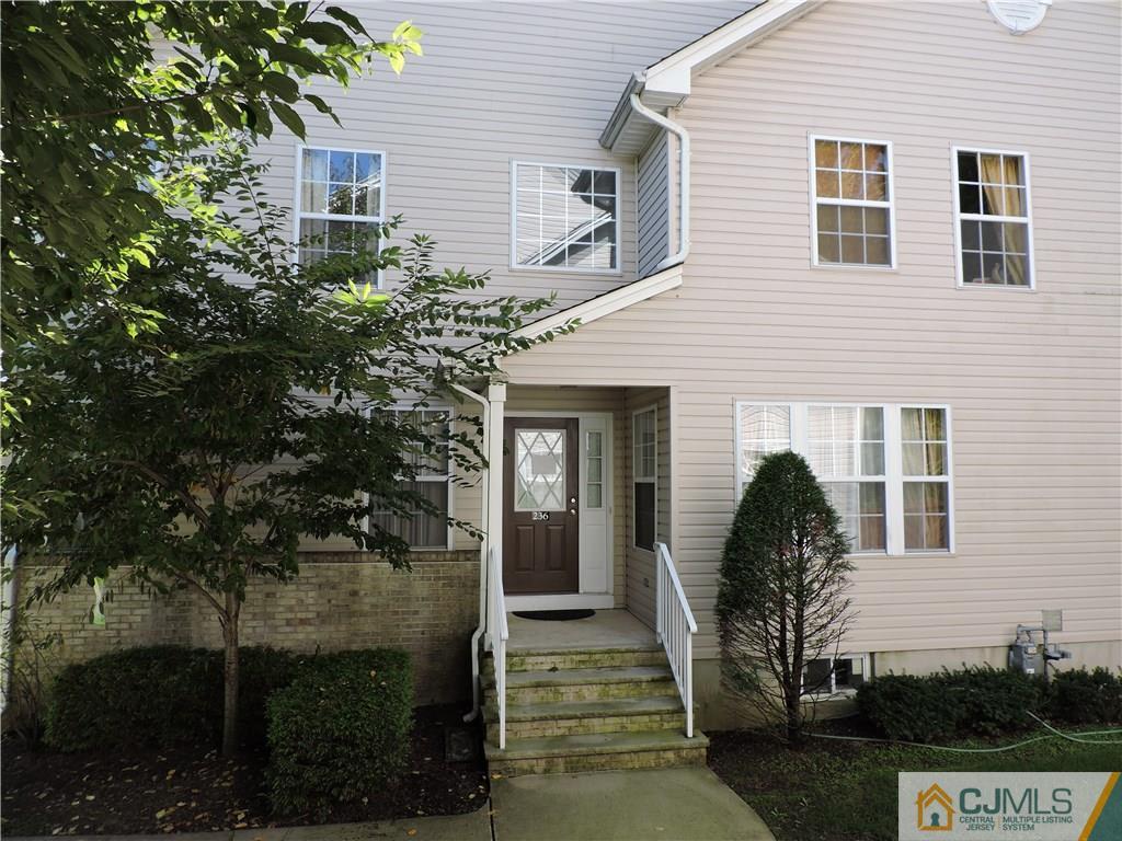 236 Hawthorne Road North Brunswick, NJ 08902 - Photo 25 of 25 a front view of a house with a yard