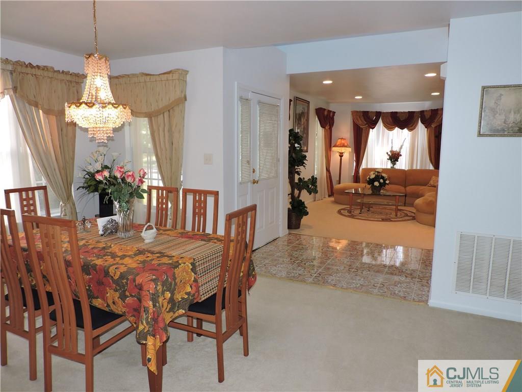 236 Hawthorne Road North Brunswick, NJ 08902 - Photo 4 of 25 a view of a dining room and livingroom