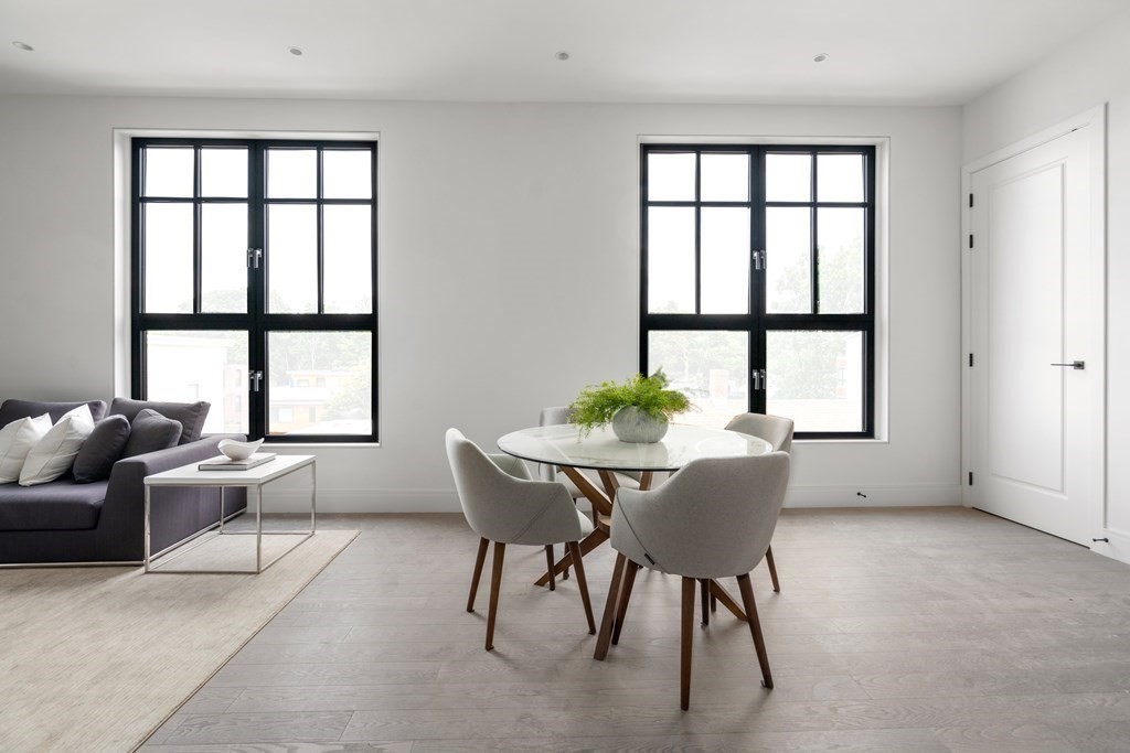 8 Leverett Street, Unit 1 Brookline, MA 02445 - Photo 11 of 29 a dining room with furniture and window