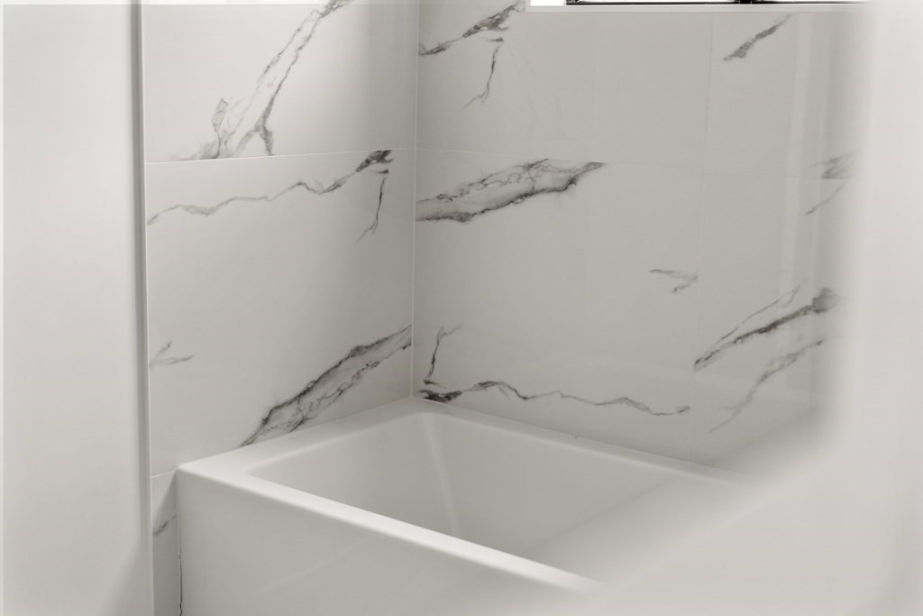 8 Leverett Street, Unit 1 Brookline, MA 02445 - Photo 27 of 29 a close up of a bathtub