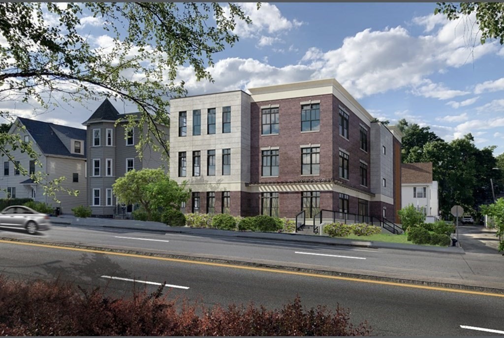 8 Leverett Street, Unit 1 Brookline, MA 02445 - Photo 28 of 29 a city street lined with buildings and trees