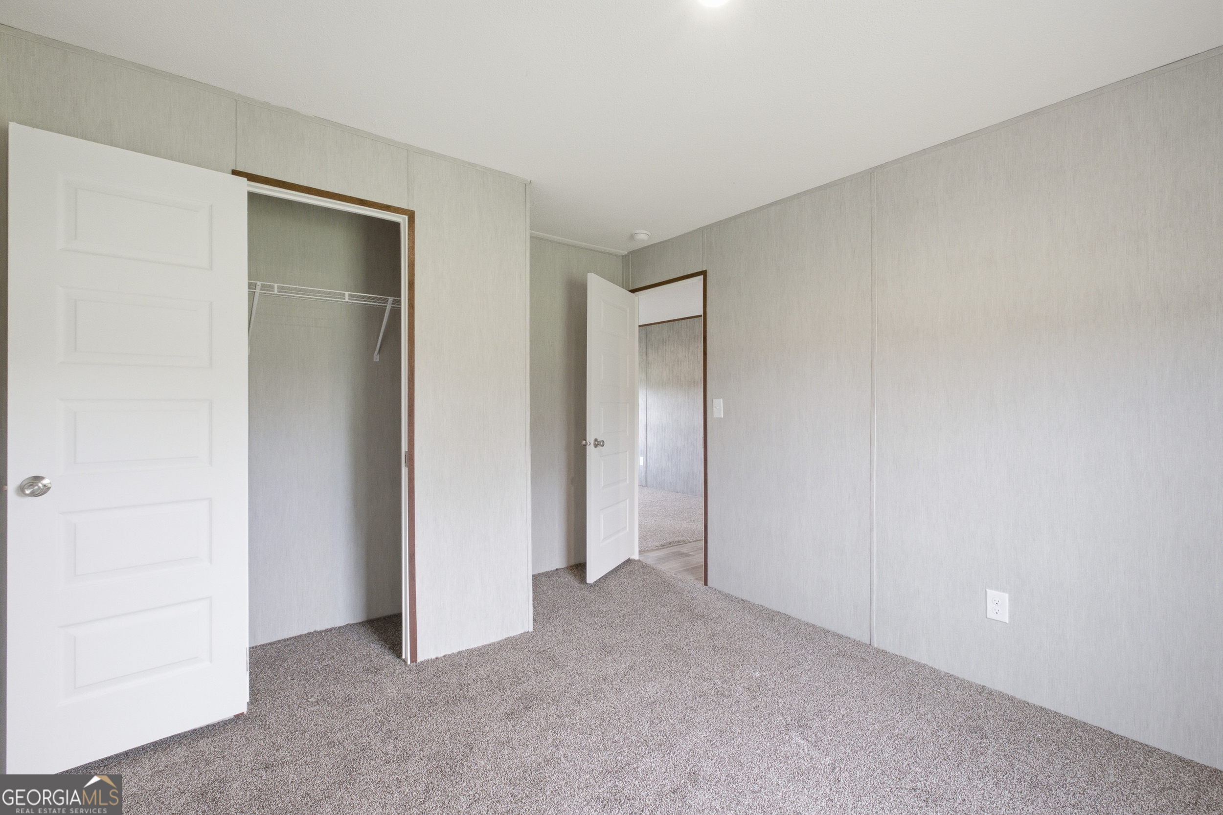 244 Ivey Hall Clark Road Garfield, GA 30425 - Photo 28 of 34 a view of an empty room